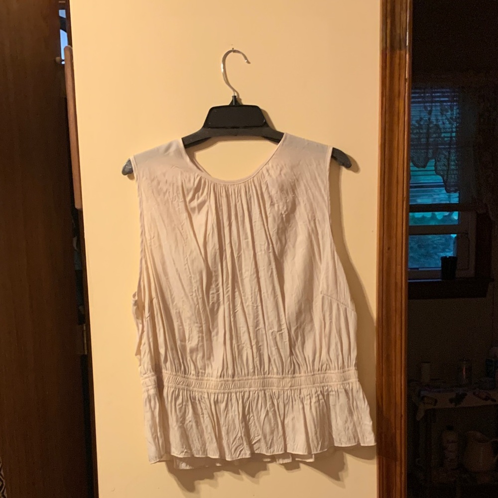 Chic Cream Sleeveless Blouse